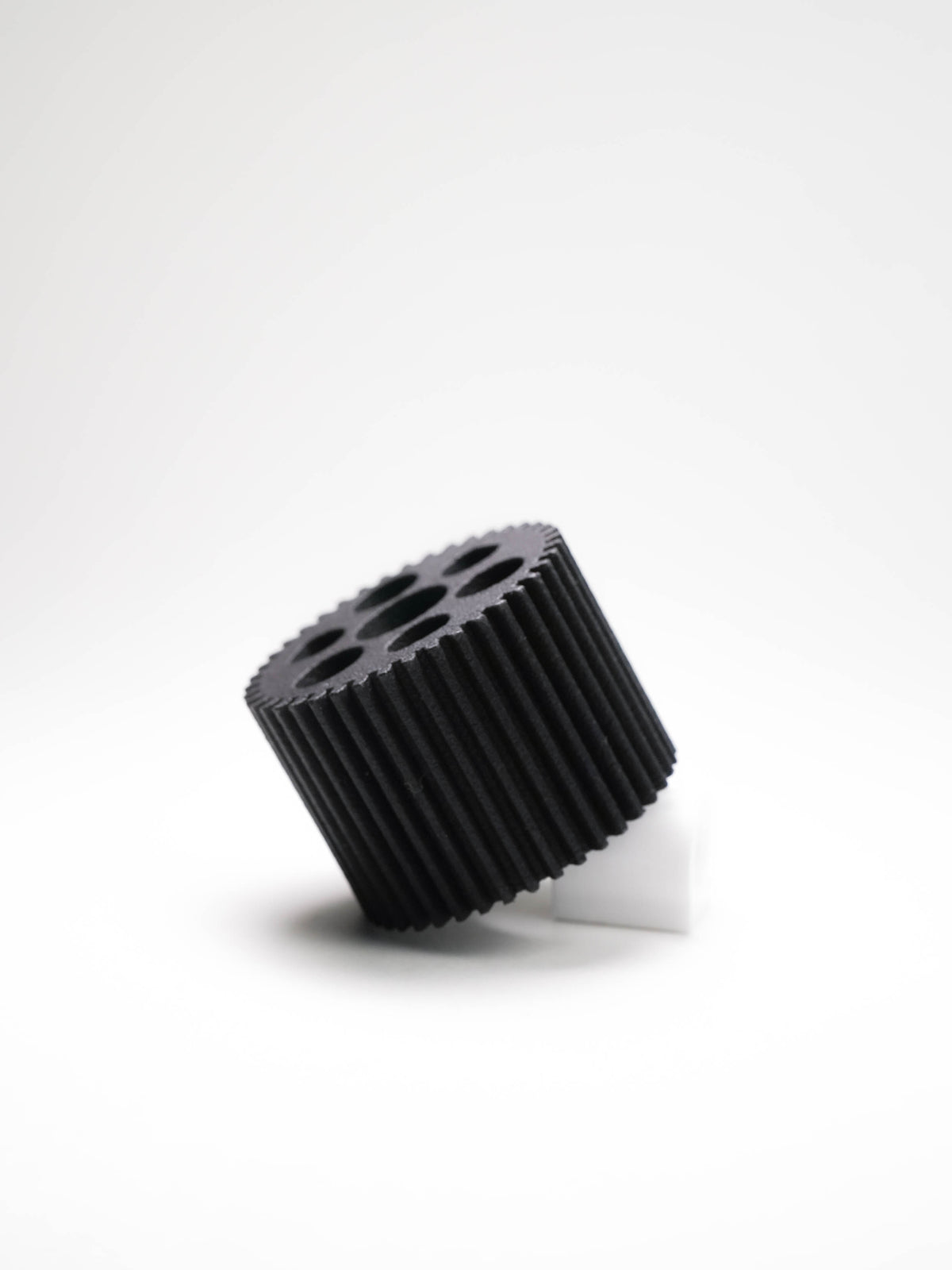 A Black Thick gear for a Heden MV21VE motor