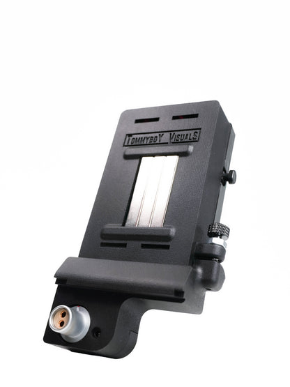 A black Tommyboy Visuals camera accessory with a Magnetic attachment 
