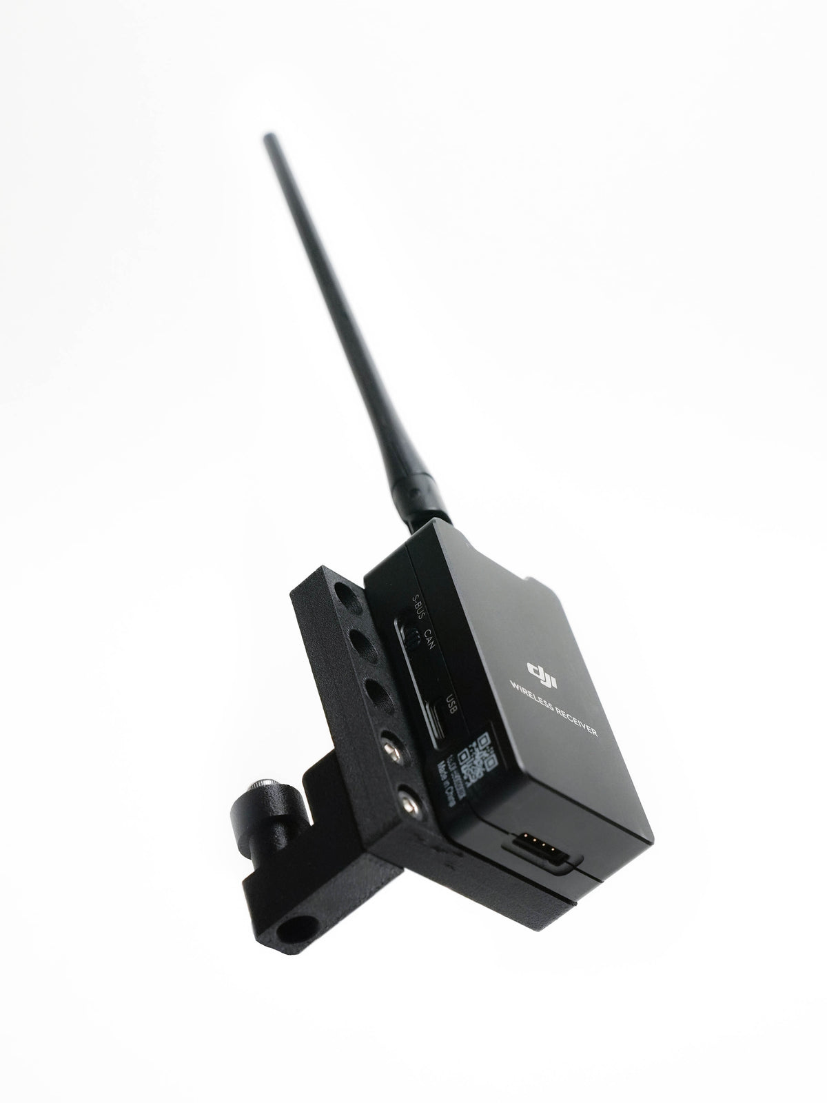 A black wireless transmitter receiver device for DJI Ronin 2 with an adjustable antenna and mounting bracket, shown on a plain white background.
