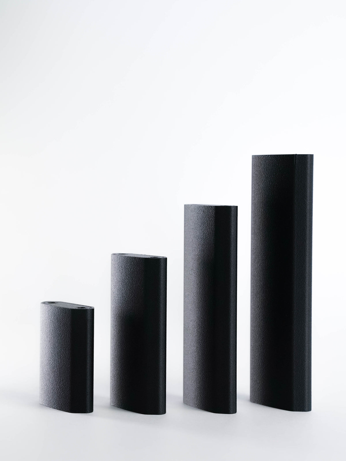 Image showing 4 different sizes of DJI Ronin tilt Extensions